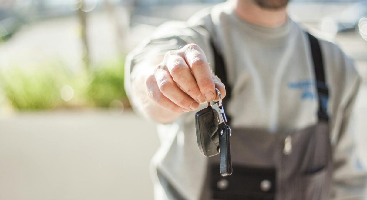 Shallow Focus Car Key held by a Man
